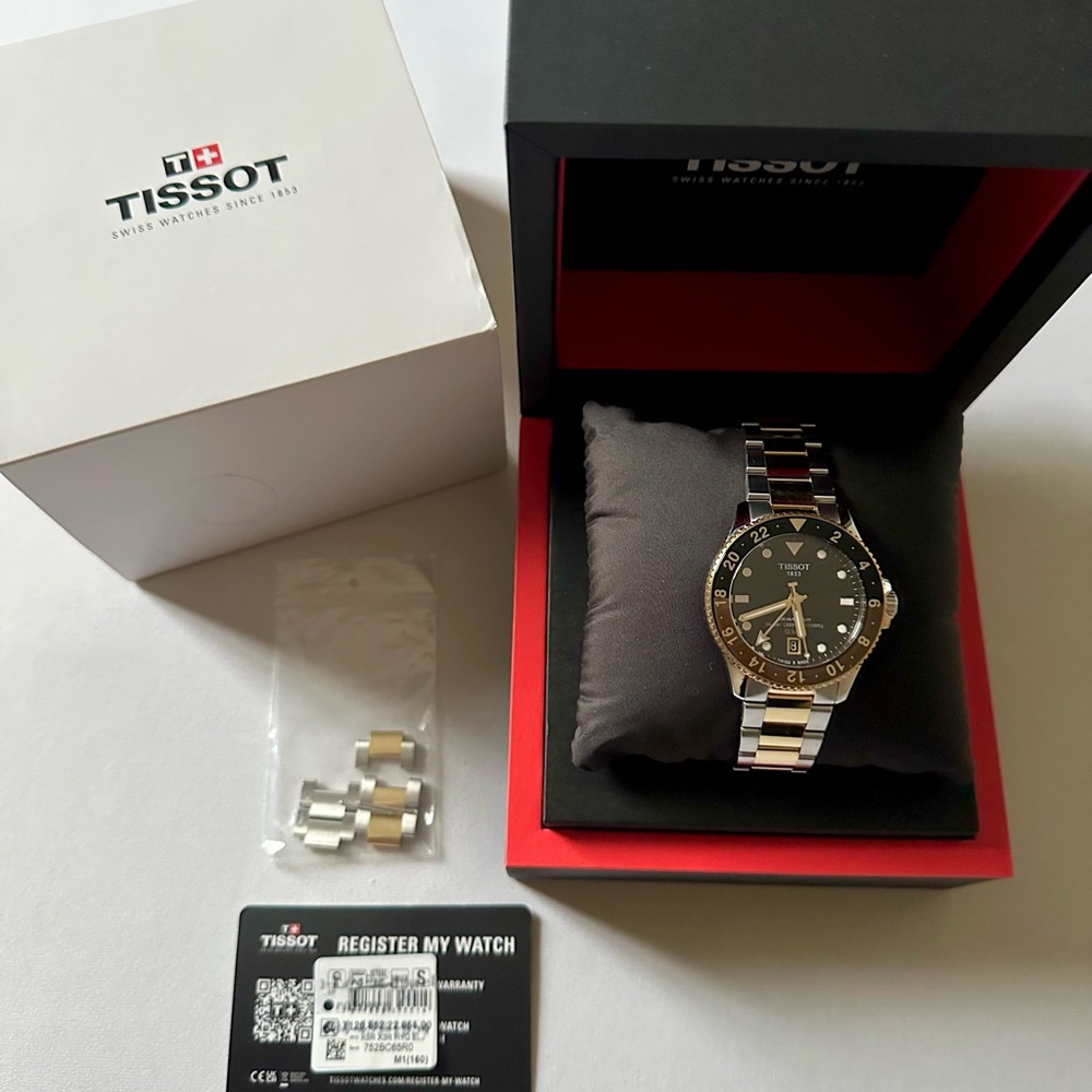 Tissot Black and Gold Watch with Two-Tone Band - Picture 1 of 2
